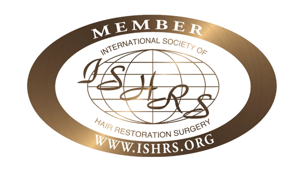 Oval-shaped gold badge with text: 